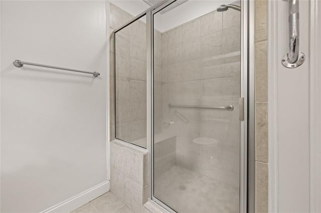 5505 Whitehall Rd, Lula, GA 30554 - bathroom with a stall shower, baseboards, and tile patterned flooring