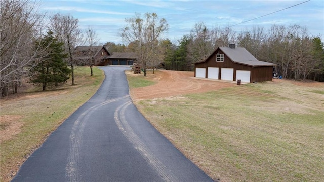 5505 Whitehall Rd, Lula, GA 30554 - view of front of home with an outbuilding, driveway, a front lawn, and a detached garage
