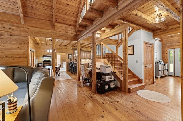 5505 Whitehall Rd, Lula, GA 30554 - living area featuring stairs, beamed ceiling, wood ceiling, and hardwood / wood-style flooring