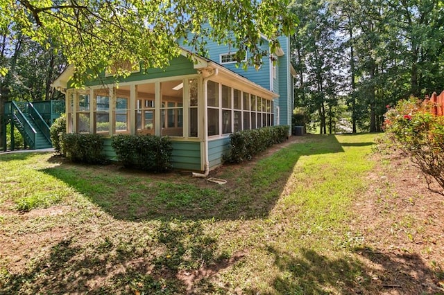 533 Coolsprings Walk, Woodstock, GA 30188 - view of grassy yard with a sunroom and stairs