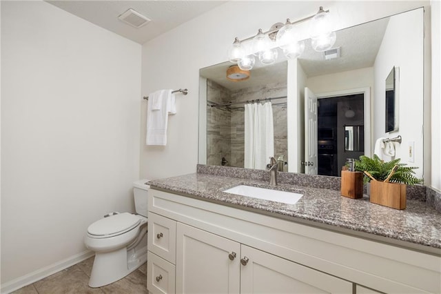 448 Teal Ct, Roswell, GA 30076 - bathroom featuring toilet, tile patterned floors, visible vents, and a tile shower