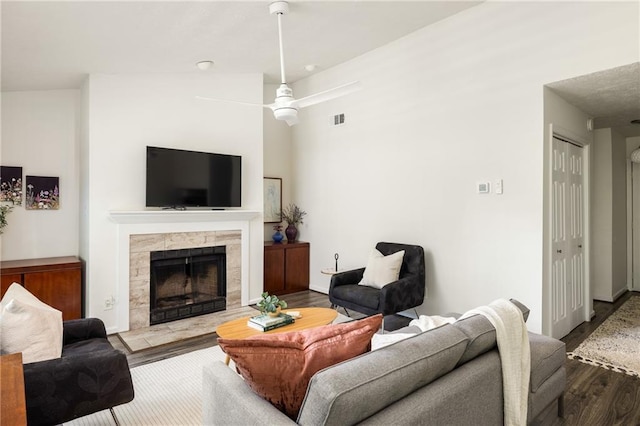 448 Teal Ct, Roswell, GA 30076 - living area with a fireplace, a ceiling fan, wood finished floors, and visible vents