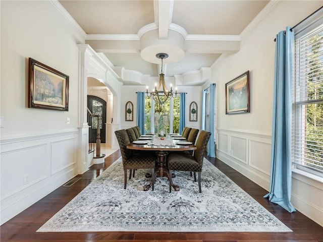 dining area with crown molding, dark hardwood / wood-style floors, beam ceiling, and a notable chandelier