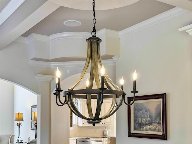 details with crown molding and an inviting chandelier