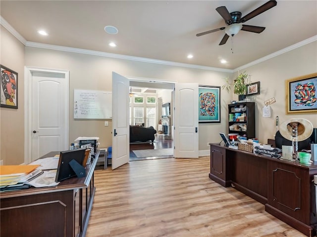 office with crown molding, ceiling fan, and light hardwood / wood-style flooring