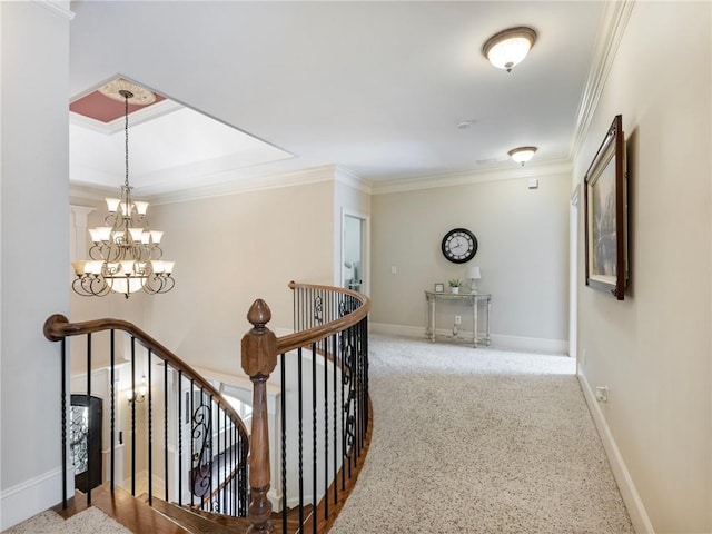 corridor featuring ornamental molding and a notable chandelier