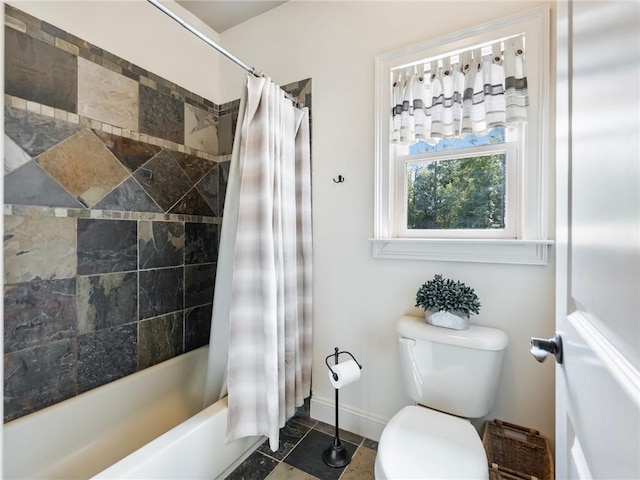 bathroom with shower / bathtub combination with curtain and toilet