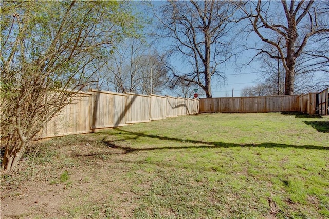 view of yard featuring a fenced backyard