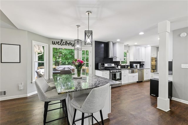 4733 Eidson Rd, Dunwoody, GA 30360 - dining space with dark wood-type flooring, baseboards, and recessed lighting