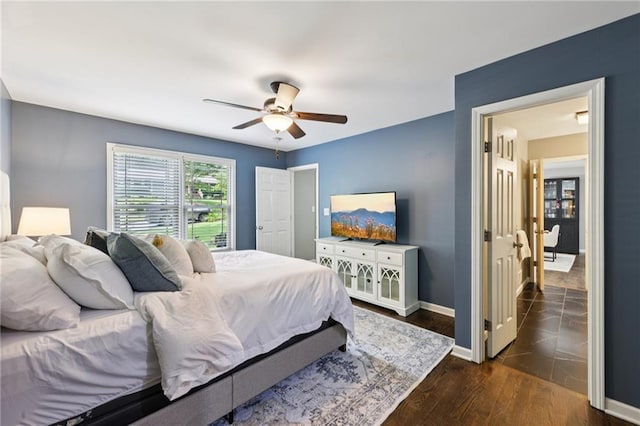 4733 Eidson Rd, Dunwoody, GA 30360 - bedroom featuring baseboards, a ceiling fan, and wood finished floors