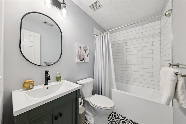 4733 Eidson Rd, Dunwoody, GA 30360 - bathroom featuring vanity, toilet, a textured ceiling, and shower / tub combo with curtain