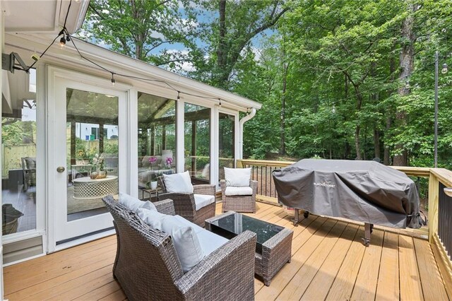 4733 Eidson Rd, Dunwoody, GA 30360 - deck with a sunroom, grilling area, and an outdoor hangout area