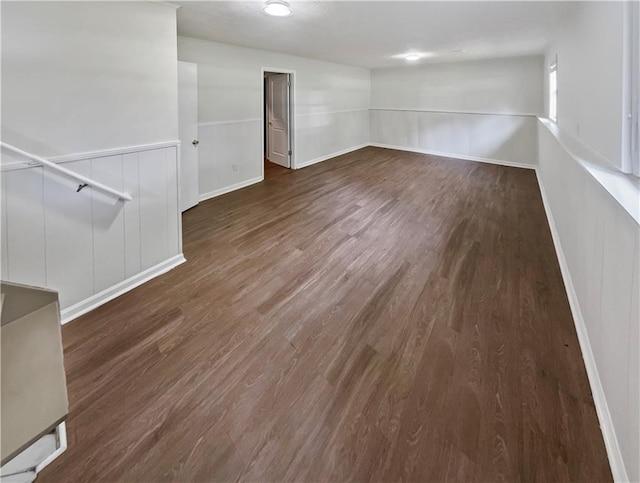 spare room featuring dark hardwood / wood-style flooring