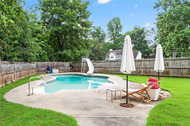 10 Callaway Ct, Hiram, GA 30141 - view of pool featuring a water slide, a patio, and a fenced backyard