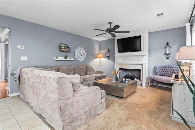 10 Callaway Ct, Hiram, GA 30141 - living area with a ceiling fan, a large fireplace, and light tile patterned flooring