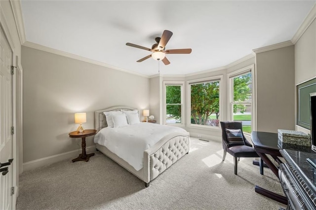 7025 Kettering Ln, Suwanee, GA 30024 - carpeted bedroom featuring baseboards, ornamental molding, and ceiling fan