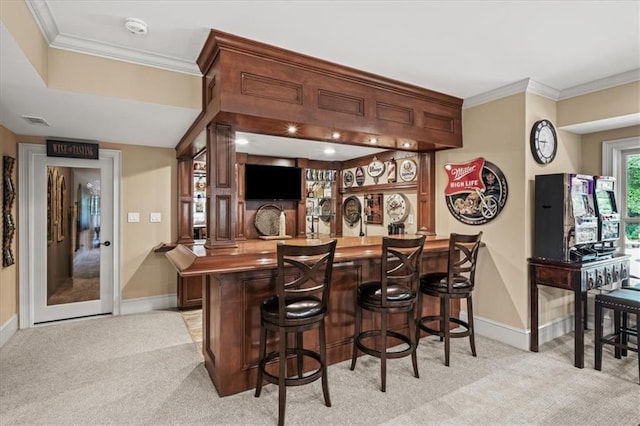 7025 Kettering Ln, Suwanee, GA 30024 - indoor wet bar featuring light carpet, baseboards, and crown molding