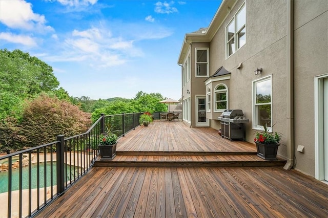 7025 Kettering Ln, Suwanee, GA 30024 - wooden deck with area for grilling and outdoor dining area