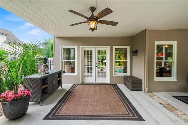 7025 Kettering Ln, Suwanee, GA 30024 - view of patio with a ceiling fan and french doors
