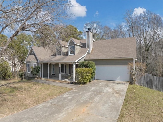 cape cod-style house featuring covered porch, concrete driveway, an attached garage, fence, and a front lawn