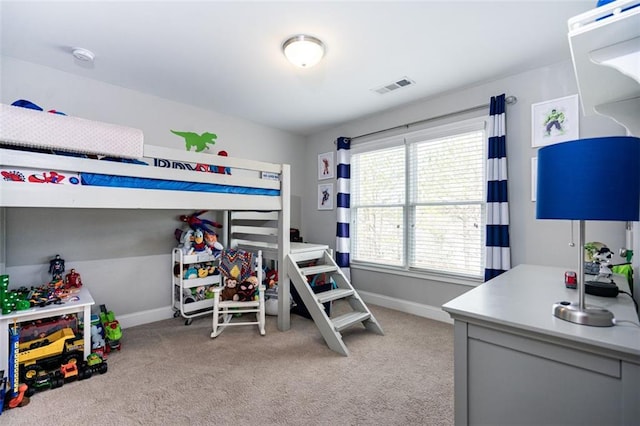 bedroom with light carpet