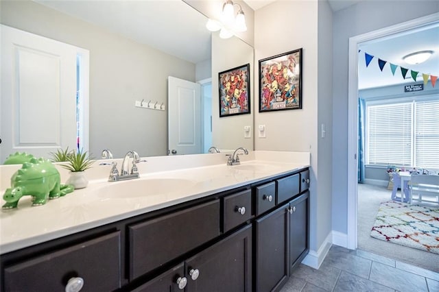 bathroom featuring vanity and tile patterned floors