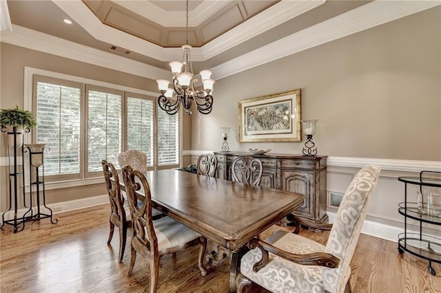 8340 Royal Melbourne Way, Duluth, GA 30097 - dining space with a chandelier, ornamental molding, and wood finished floors
