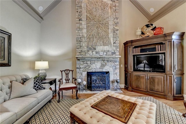 8340 Royal Melbourne Way, Duluth, GA 30097 - living area featuring crown molding, wood finished floors, a stone fireplace, and high vaulted ceiling