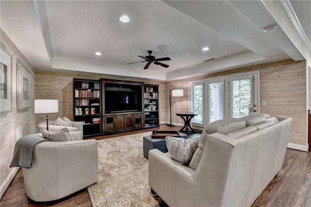 8340 Royal Melbourne Way, Duluth, GA 30097 - living area with a tray ceiling, baseboards, a ceiling fan, wood finished floors, and recessed lighting