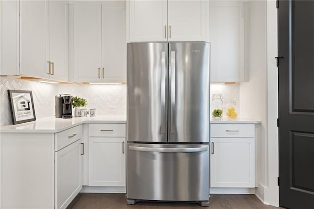 9110 Greenway Ct, Gainesville, GA 30506 - kitchen with freestanding refrigerator, light countertops, white cabinetry, backsplash, and dark wood finished floors