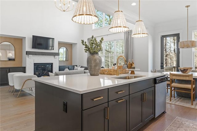 9110 Greenway Ct, Gainesville, GA 30506 - kitchen featuring a sink, light wood-type flooring, stainless steel dishwasher, light countertops, and recessed lighting