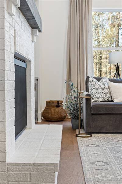 9110 Greenway Ct, Gainesville, GA 30506 - living area featuring healthy amount of natural light and a fireplace