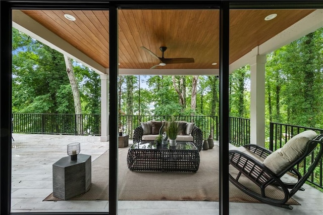 6178 Lake Lanier Height Rd, Buford, GA 30518 - view of patio featuring ceiling fan, an outdoor hangout area, and view of wooded area