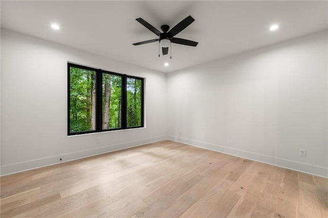 6178 Lake Lanier Height Rd, Buford, GA 30518 - empty room featuring light wood-style flooring, ceiling fan, and recessed lighting