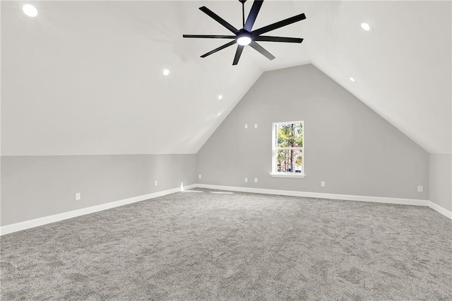 bonus room featuring ceiling fan, lofted ceiling, and carpet