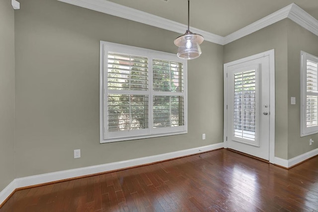 interior space with crown molding and dark hardwood / wood-style floors