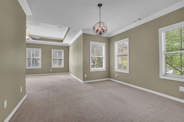 carpeted empty room with crown molding, a healthy amount of sunlight, and ceiling fan with notable chandelier