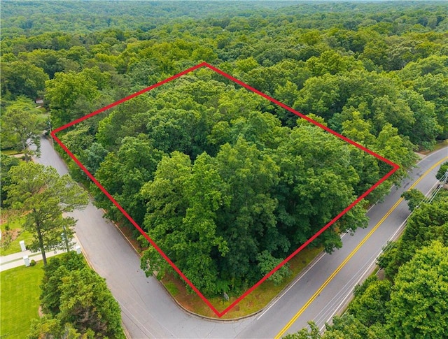 5680 Whitner Dr, Atlanta, GA 30327 - aerial view of property and surrounding area with property parcel outlined and a heavily wooded area