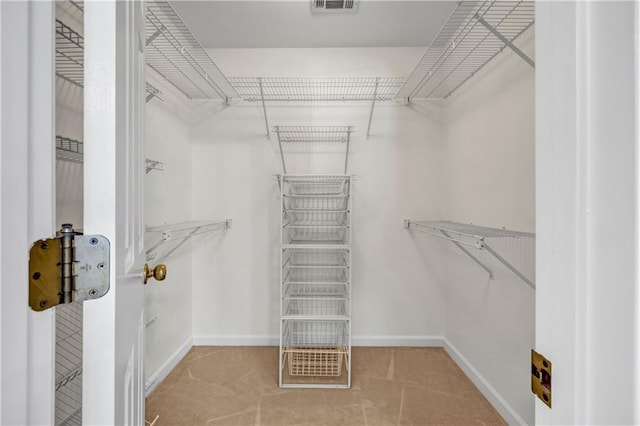 spacious closet with visible vents