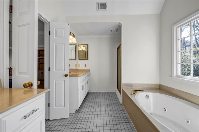 full bathroom featuring vanity, a healthy amount of sunlight, visible vents, and tile patterned flooring