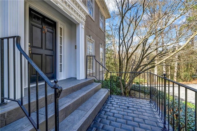 entrance to property with a balcony