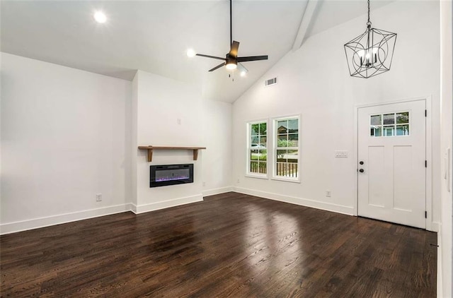 1317 Bernard St NW, Atlanta, GA 30314 - unfurnished living room featuring dark wood-style floors, a glass covered fireplace, ceiling fan, high vaulted ceiling, and beamed ceiling