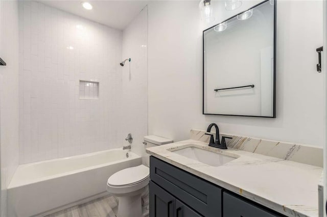 1317 Bernard St NW, Atlanta, GA 30314 - full bathroom featuring toilet,  shower combination, vanity, wood finished floors, and recessed lighting