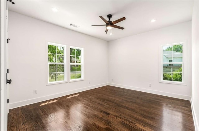 1317 Bernard St NW, Atlanta, GA 30314 - empty room with plenty of natural light, a ceiling fan, baseboards, dark wood finished floors, and recessed lighting