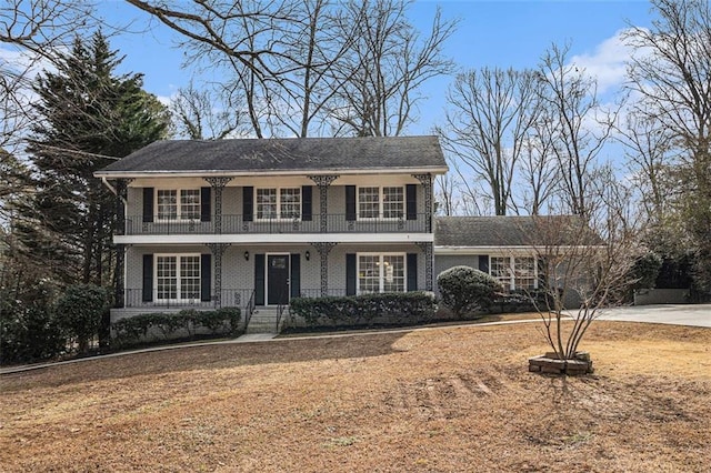 colonial-style house with a porch