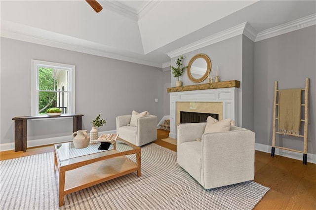 12995 Bucksport Dr, Roswell, GA 30075 - living room featuring wood finished floors, a premium fireplace, crown molding, ceiling fan, and baseboards