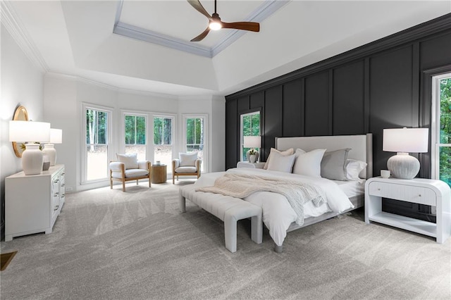12995 Bucksport Dr, Roswell, GA 30075 - bedroom with light carpet, ornamental molding, a raised ceiling, and a ceiling fan