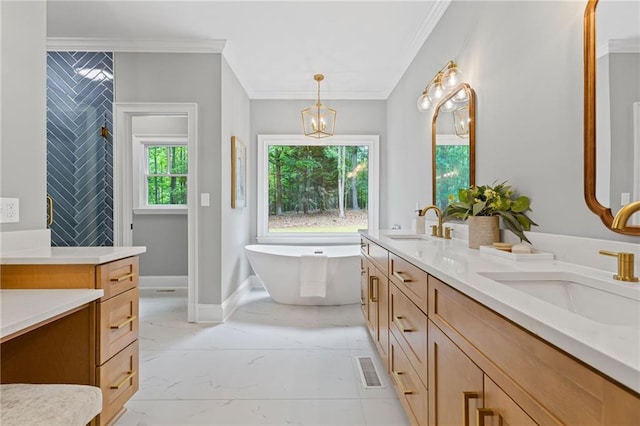 12995 Bucksport Dr, Roswell, GA 30075 - full bath with marble finish flooring, double vanity, a freestanding tub, ornamental molding, and a chandelier