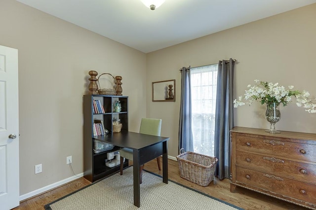 home office with light wood-type flooring