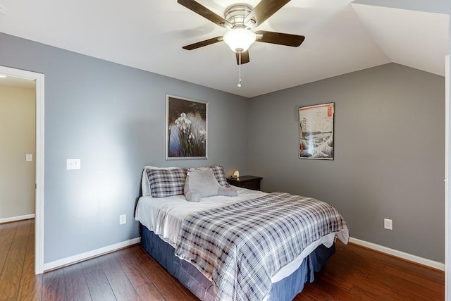 bedroom featuring dark wood-type flooring, ceiling fan, and lofted ceiling